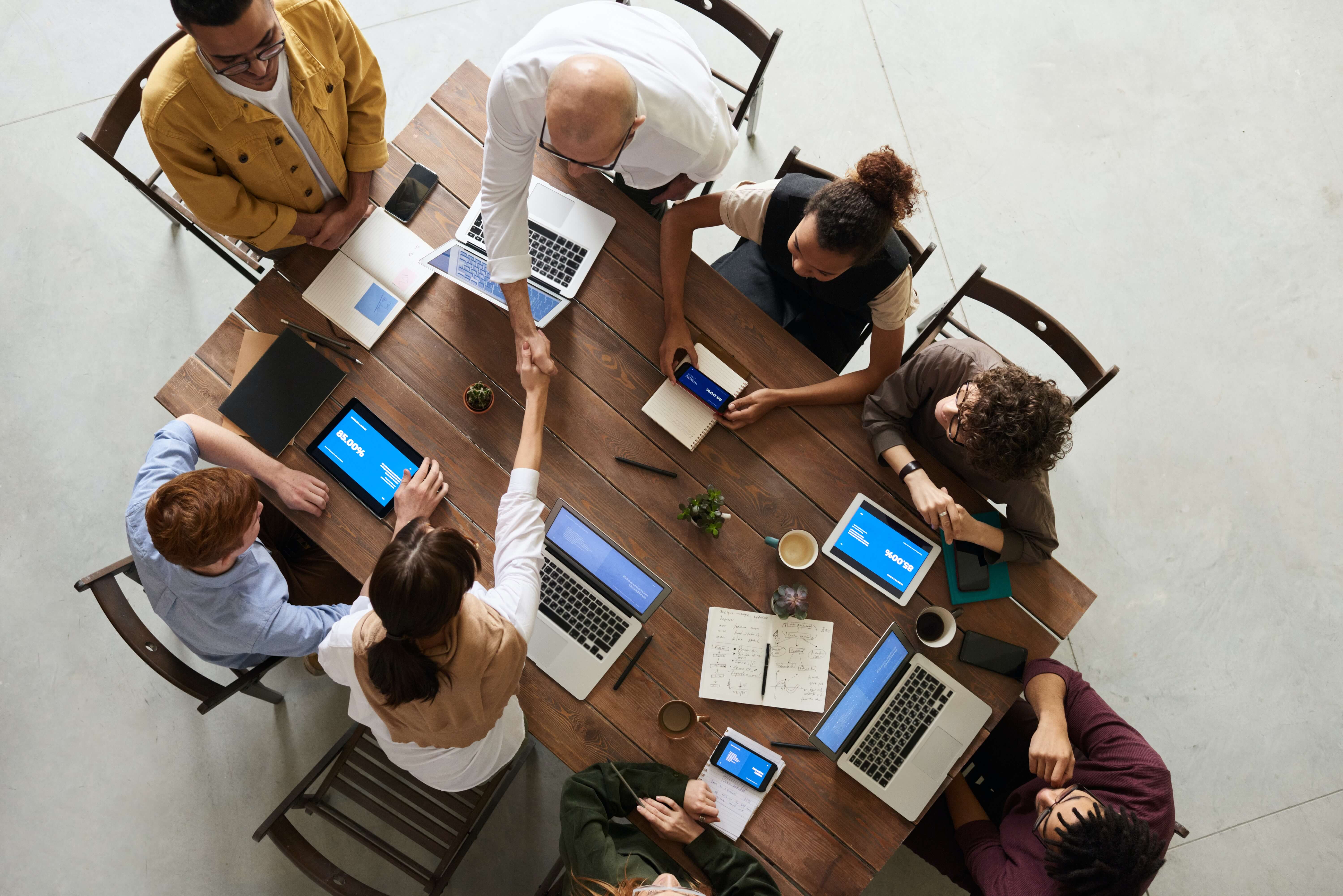 businesspeople working together at a table